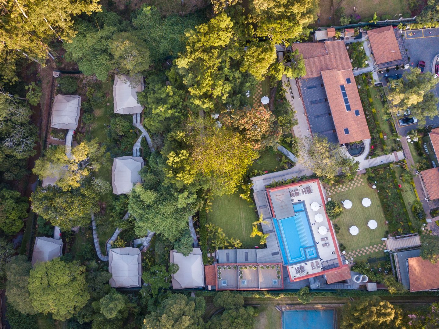 The full layout of a property and its gardens, seen from the air